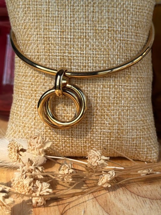 Bracelet Éterna – Acier inoxydable doré, breloque à deux anneaux (6,5 cm)